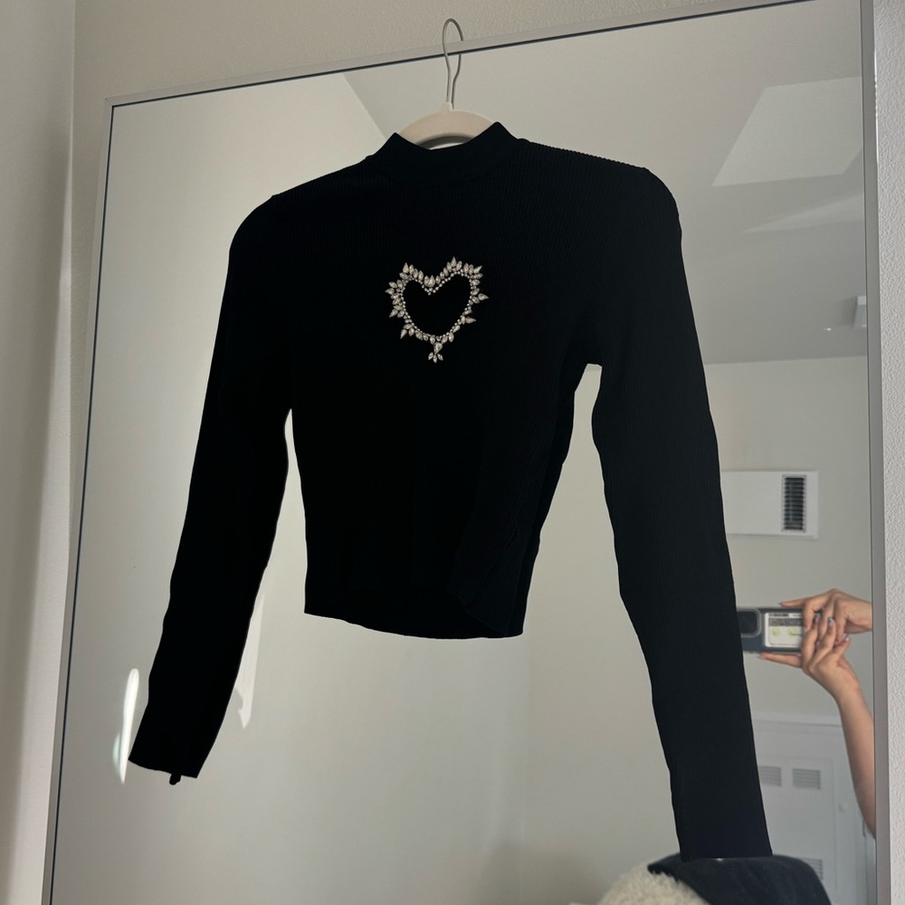 Black long sleeve crop top with heart design